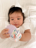 Itzy Mitt™ Silicone Teething Mitts: Dinosaur - Premium teethers from Itzy Ritzy - Just $9.95! Shop now at Pat's Monograms
