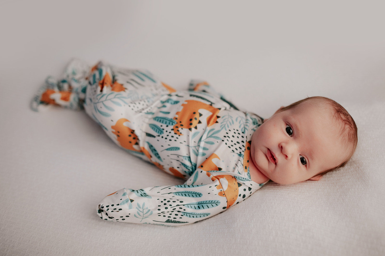 Dinosaur Knotted Baby Gown and Knot Cap - Premium Just for baby from Three Little Tots - Just $24.95! Shop now at Pat's Monograms